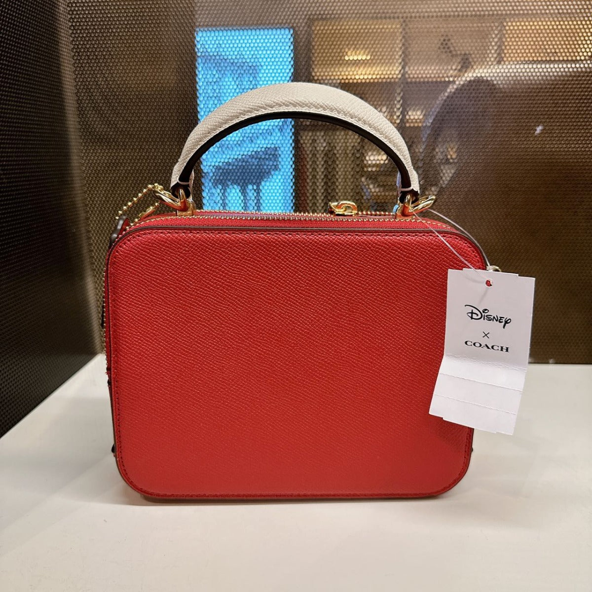 Coach CC377 Disney X Coach Box Crossbody With Cruella Motif IM/Red Apple Multi Coach CC377 Disney X Coach Box Crossbody With Cruella Motif IM/Red Apple Multi